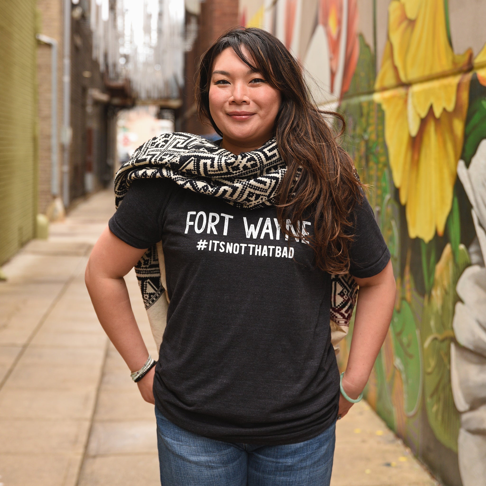Fort Wayne #itsnotthatbad black heather t-shirt on model with scarf by mural