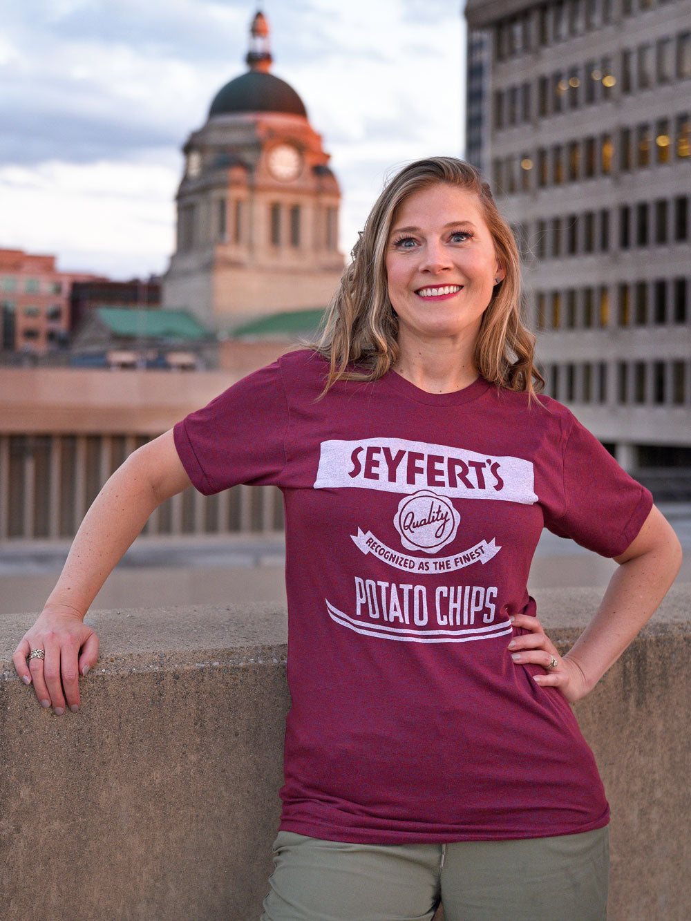 Seyfert's Potato Chips cranberry heather t-shirt on model on downtown Fort Wayne rooftop